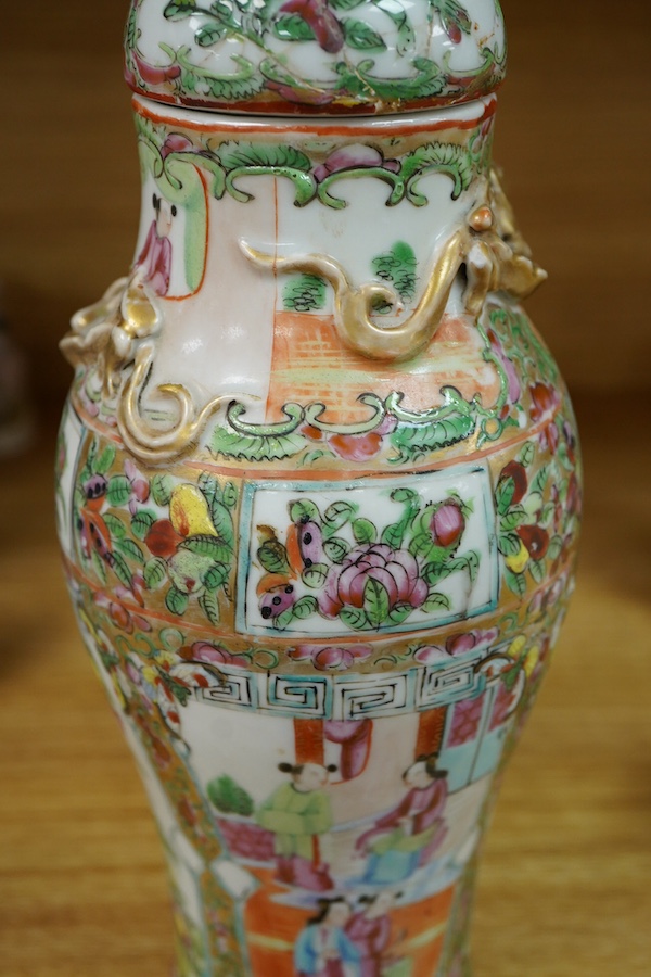 A 19th century Chinese Canton famille rose vase and cover (cover repaired), 28cm high